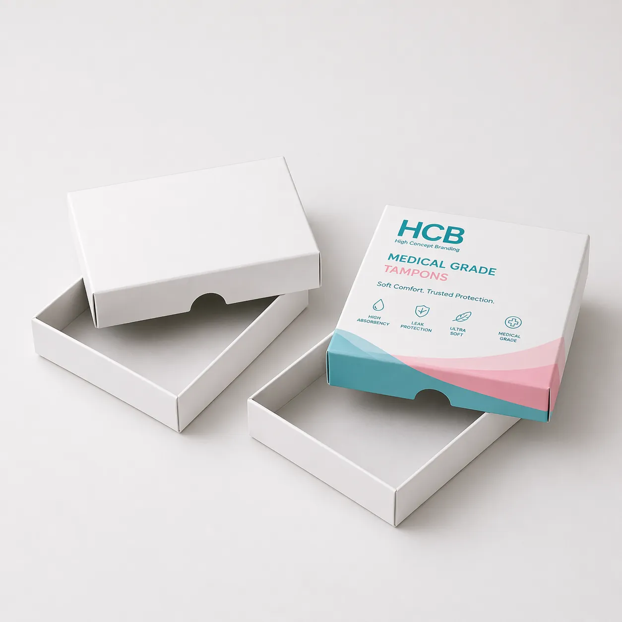 A white retail box standing beside a teal floral branded box for luxury medical tampons. class=